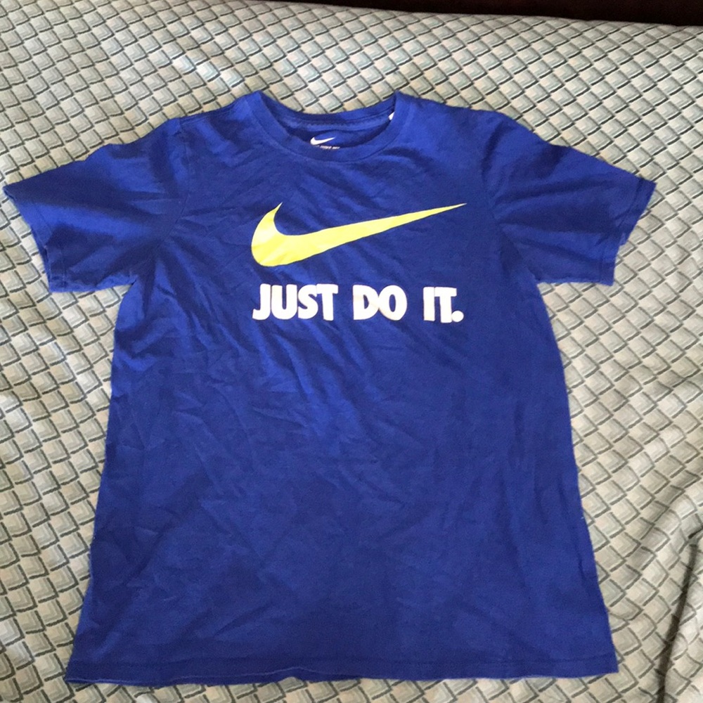 Blue athletic Nike t-shirt.